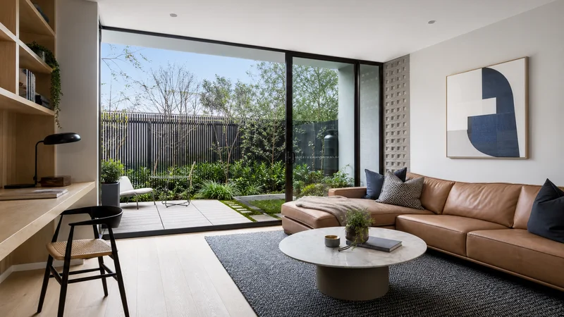 Modern Hampton family room staged with a practical study zone